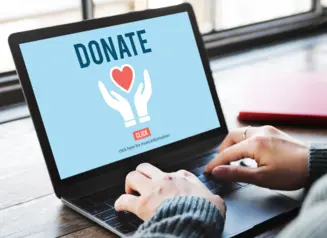 Laptop with "Donate" on screen. 