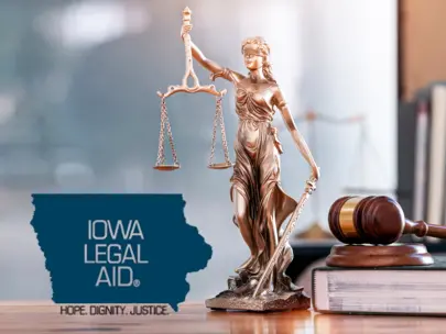 Scales of justice, gavel, and Iowa Legal Aid logo.